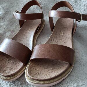 **Step Into Comfort with Sun & Stone Sandals**